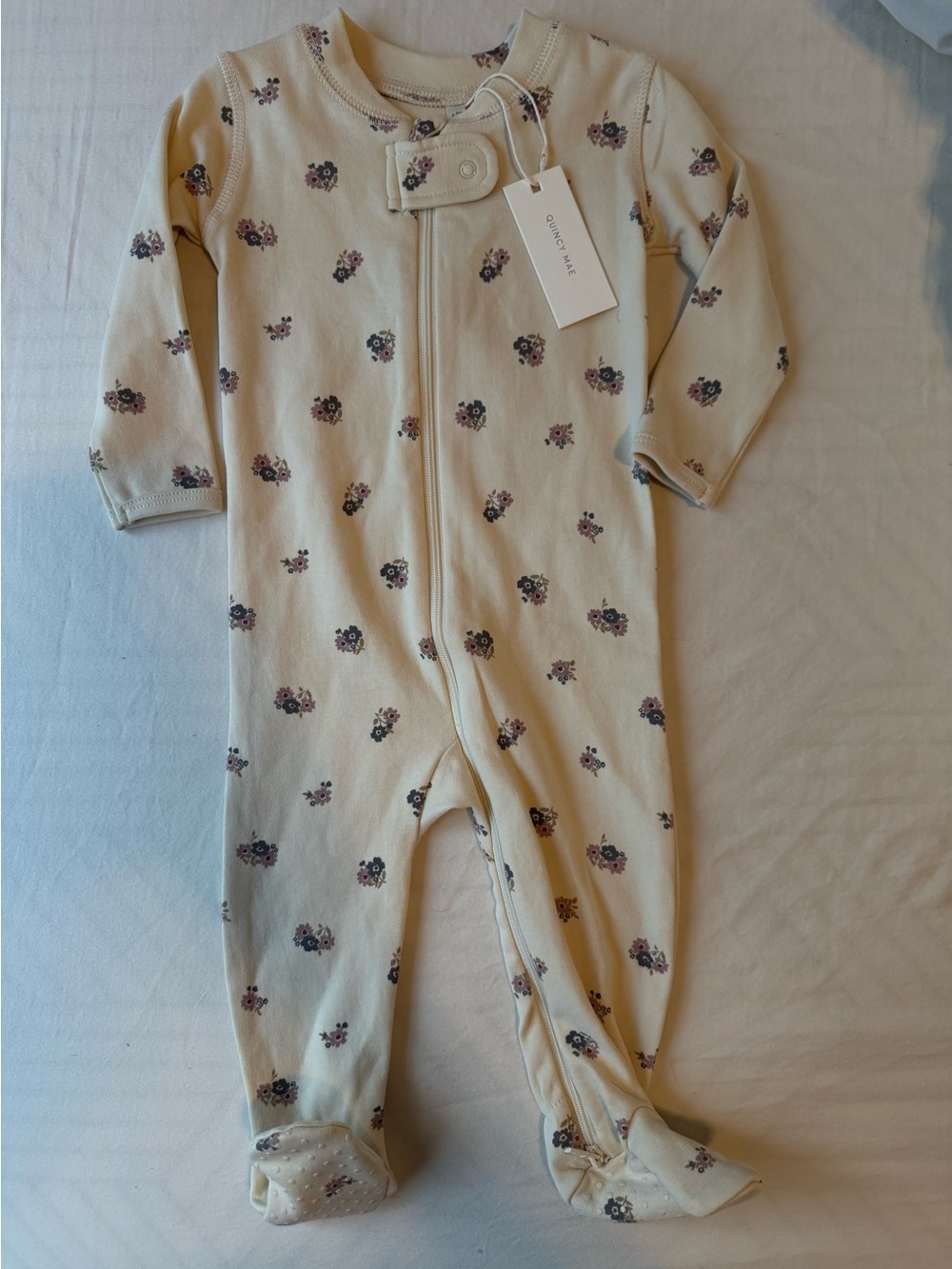 Quincy Mae Cream Footed One-Piece with Purple Floral Print